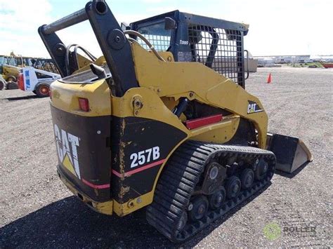 257 skid steer auxiliary|cat 257b auxiliary hydraulics.